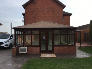 Showing a tiled conservatory roof